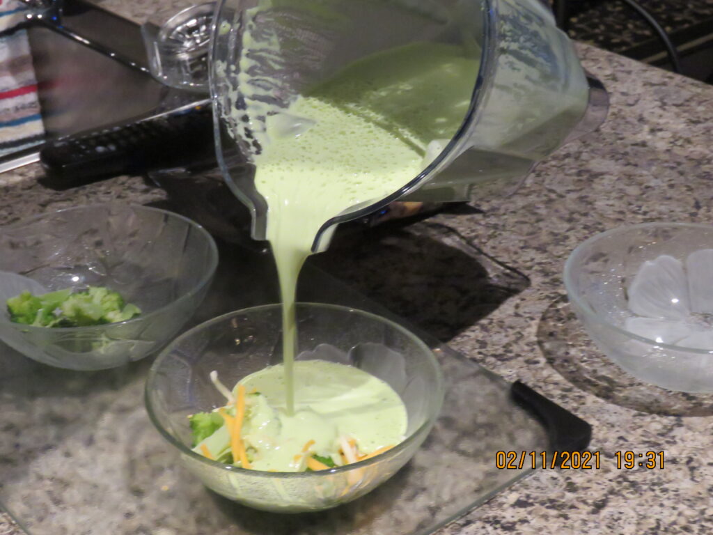 pouring cream of broccoli