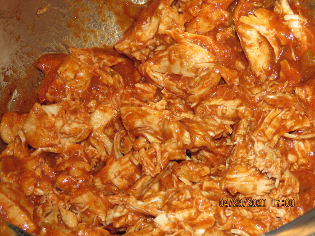 shredded chicken in Homemade Enchilada Sauce