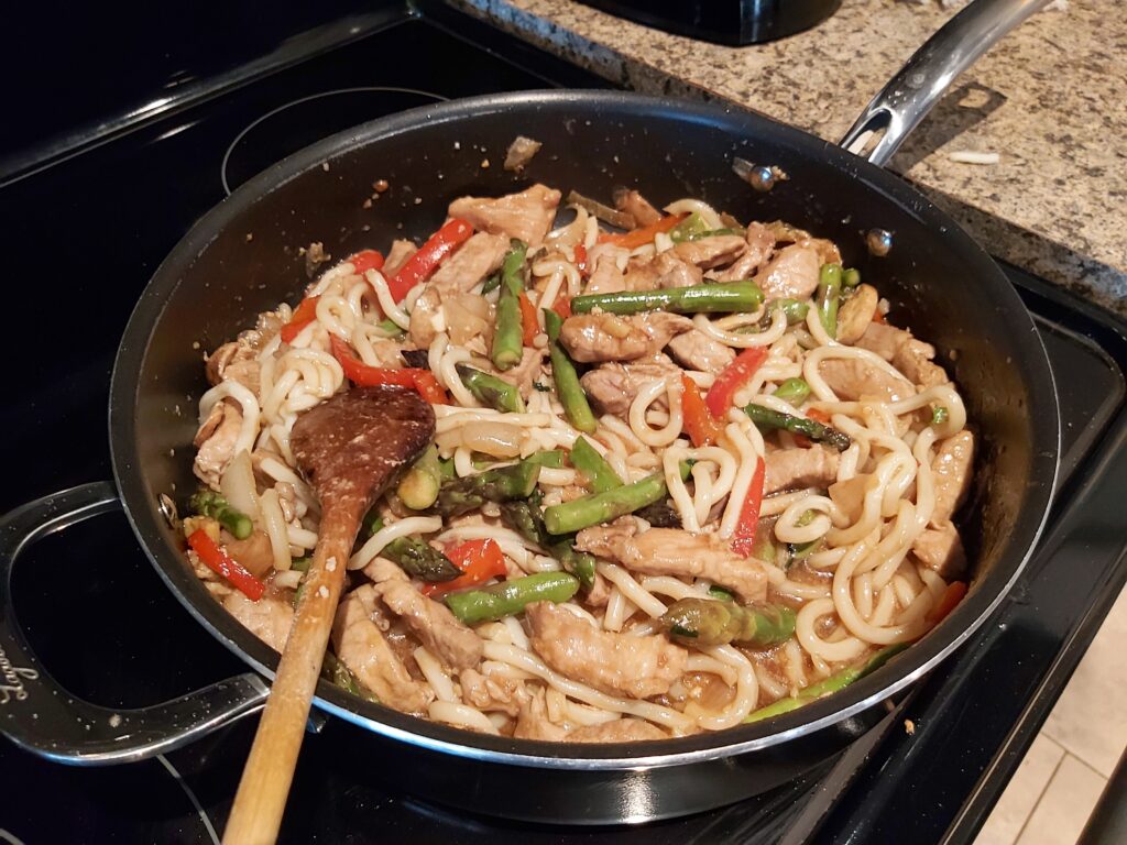 Stir Frying Pork and Asparagus with Noodles