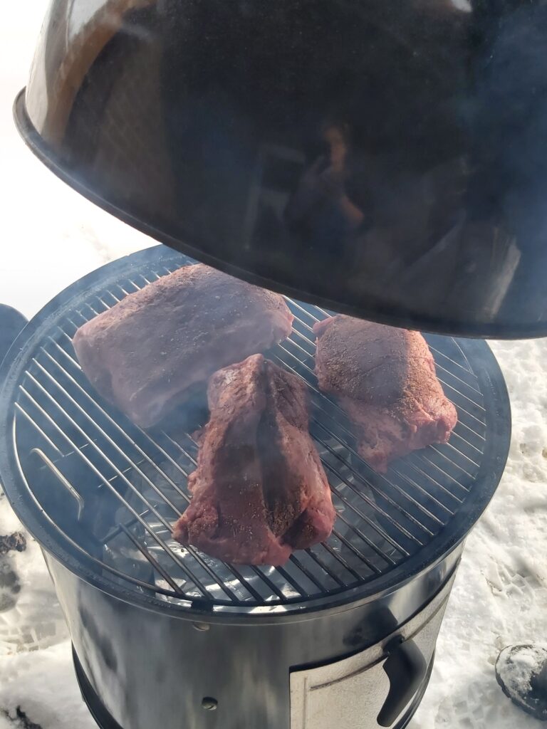 smoker with meat winter